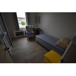 *Contents of Room 12 to Include Single Divan, Cantilever Bed Table, Wingback Armchair, and a