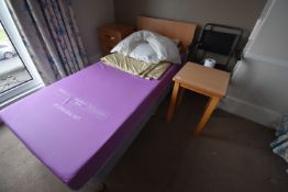 *Single Divan with Waterproof Mattress, Commode Wheelchair, and an Occasional Table