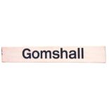 A Gomshall plastic and wooden backed platform sign, on a white ground, 30cm high, 207cm wide. (AF)