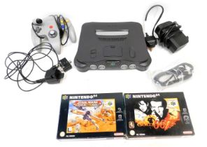A Nintendo 64, with controllers and accessories, and GoldenEye 007 and Star Wars Rouge Squadron. (1