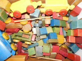 A wooden pull along train, wooden blocks, etc. (1 box)