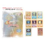 Pokemon hologram cards, including Charizard, Gyarados, Lampress, Machamp, Mewtwo, Nine Tails, Poliwr