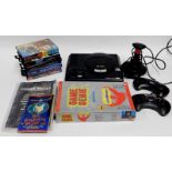 A Sega Mega Drive controllers, accessories and games, including The Terminator, Combat 3, Alien 3, D