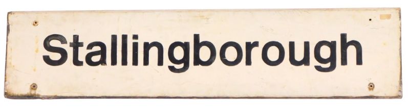 A Stallingborough metal platform sign, on a white ground, 29cm high, 133cm wide. (AF)