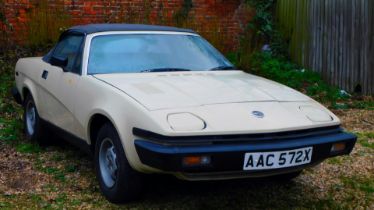 A Triumph TR7, registration AAC572X, in cream with soft top lid, spare alloy, manual, first register