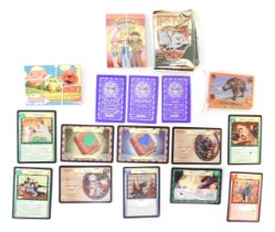 Various trading cards, including Harry Potter Trading game cards, Walking with Beasts, and twelve Po