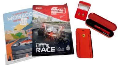 Ferrari collectables, comprising a pair of chrome Ferrari cuff links, Monaco Official Programme for