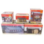 Hornby OO gauge Skaledale buildings, comprising R9851 Country Dutch Barn, R9853 Eastry Cricket Club,