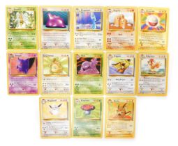 Thirteen Pokemon cards with stars, including Beedrill, Ditto, Dragonair, Doug Trio, Electrode, Genga