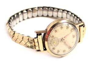 A ROC 9ct gold cased lady's wristwatch, with small circular watch head, on silvered dial, on expandi
