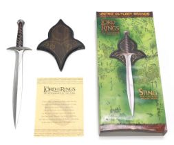 A reproduction Lord of the Rings Sting ornamental sword, boxed.