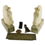 A pair of alabaster carved horse's heads, each on a rectangular base, 25cm high, a letter clip, etc.
