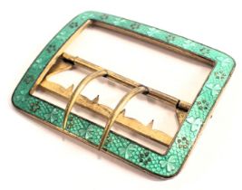 An enamel belt buckle, of rectangular design, with green enamel clover border, with brass backing, 5