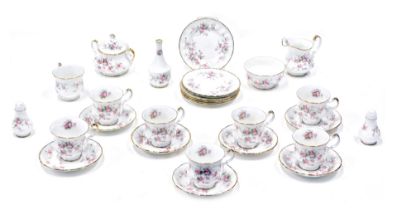 A Paragon china Victoriana Rose pattern part tea and dinner service, comprising sugar bowl, jar and
