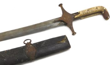 A 19thC Indian sword or sabre with curved blade, iron guard, and part ivory handle, the blade with i