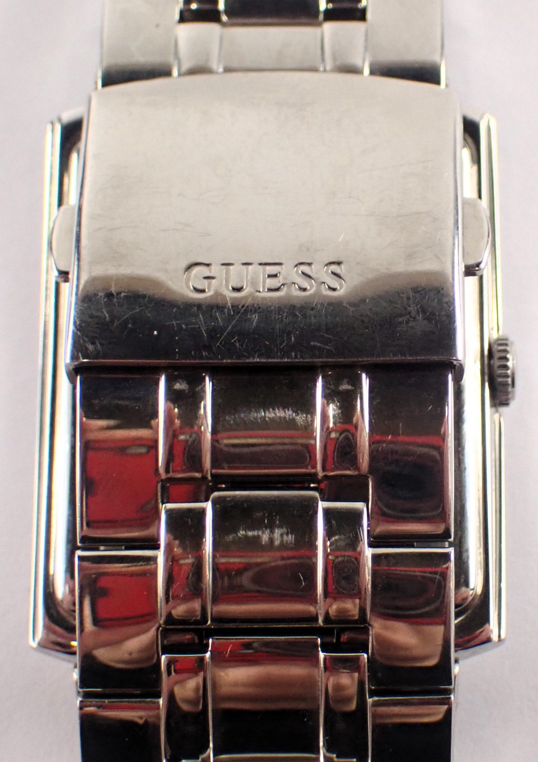 A Guess gent's stainless steel wristwatch, with a blackened Roman numeric dial, 2.5cm x 3.5cm, on st - Image 4 of 4