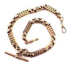 A watch chain, of large linked and rubbed design, comprising two bracelets with clips and central T