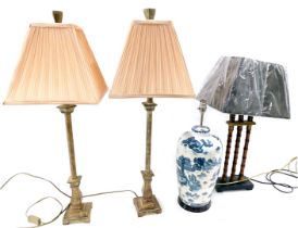 A collection of table lamps, to include a resin lamp painted to simulate bamboo, with shade, 66cm hi