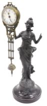 A Junghans spelter and brass figural mystery type clock, with domed base, 33cm high.