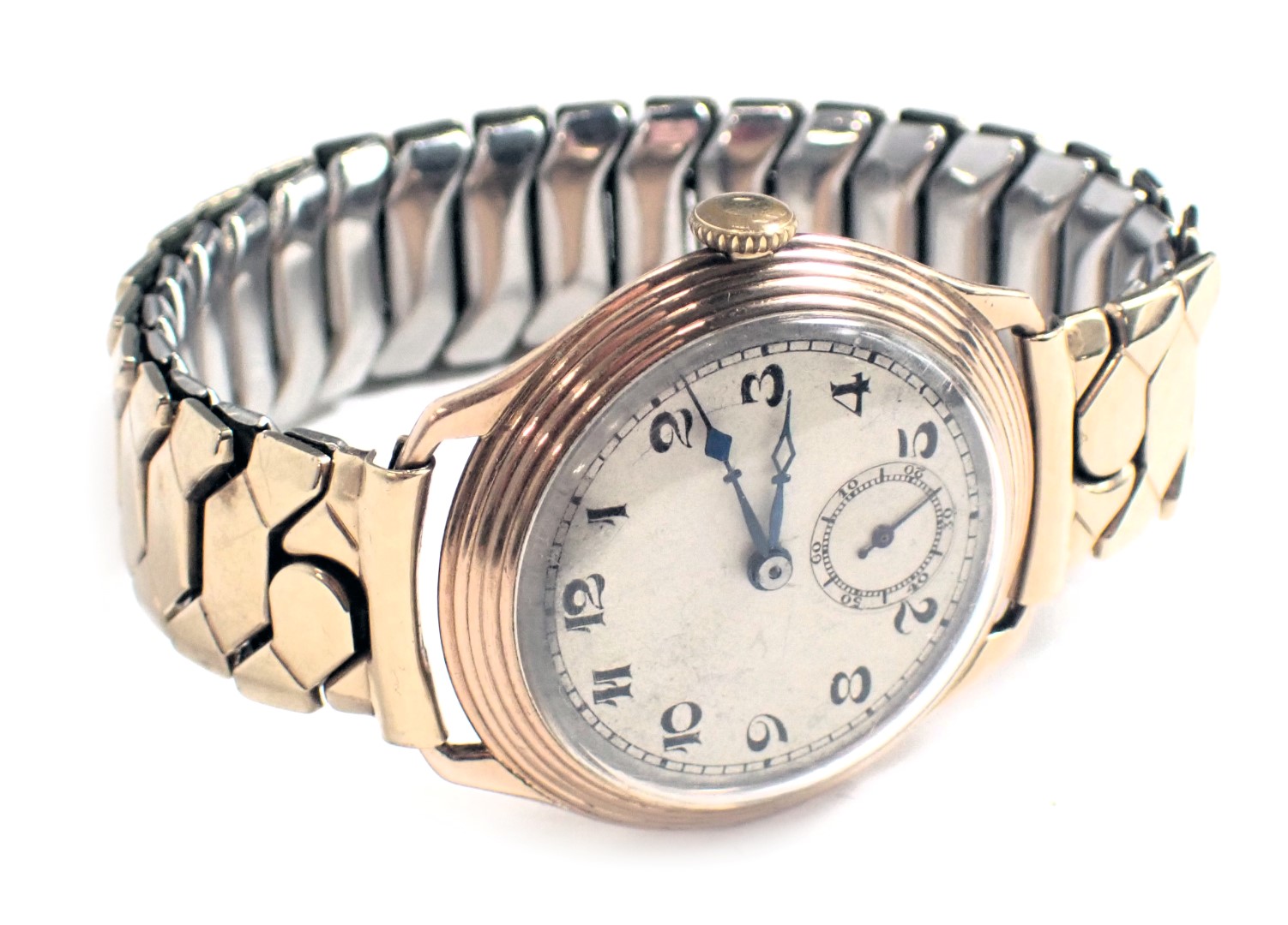 A 9ct gold gent's wristwatch, with a silvered numeric dial with blue hands and seconds dial, Swiss 1