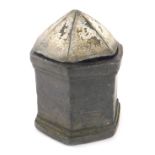 A 19thC lead tobacco jar, with faceted domed cover, 14cm high. (AF)