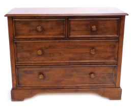A continental cherrywood chest of drawers, the top with a moulded edge with two short and three long