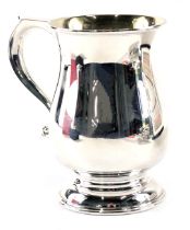 A Queen Elizabeth II silver tankard, with moulded thumb piece and gilded interior, maker JR, Birming