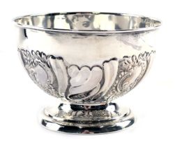 An Edward VII silver sugar bowl, with embossed scroll and swag design, on stepped foot, Birmingham 1
