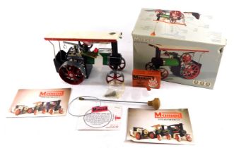 A Mamod steam tractor, boxed.