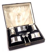 A Mappin and Webb silver Art Deco cruet set, comprising salt and pepper, two preserve bowls, and a p