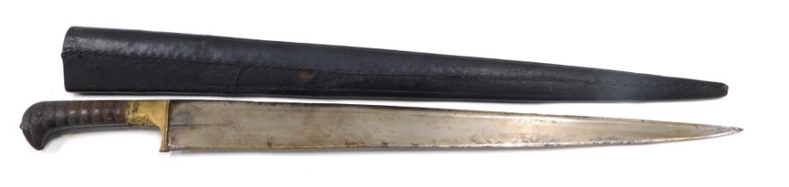 A 19thC Afghan Khyber knife, with broad back and brass hilt, and ribbed horn grip, with small loop h