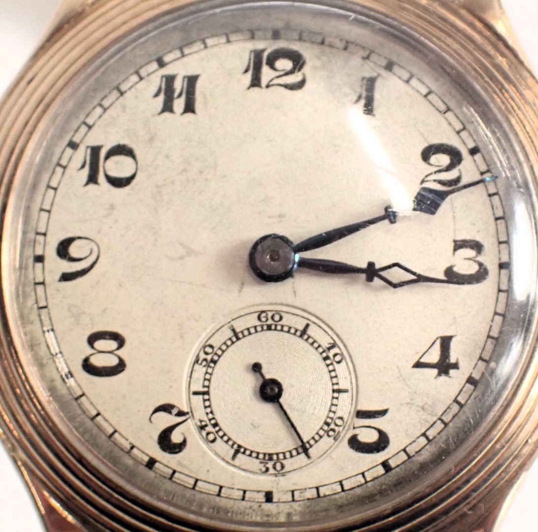 A 9ct gold gent's wristwatch, with a silvered numeric dial with blue hands and seconds dial, Swiss 1 - Image 2 of 3