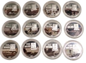 A collection of Windsor Mint WWII collectors coins, comprising twelve collectors coins in presentati