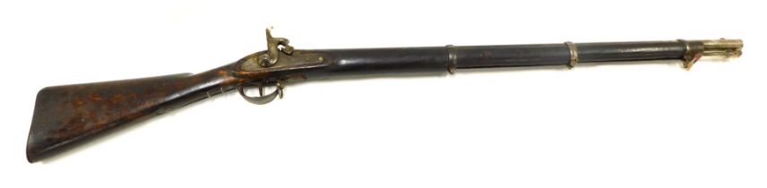A 19thC percussion musket, with ramrod, the side lock plate stamped with a crown cypher East India C