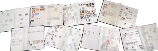 Philately. A collection of QEII UK stamps postally worn, in presentation albums (8 albums)