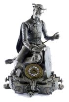 A late 19thC French spelter figural mantel clock, modelled in the form of a gentleman reading a book
