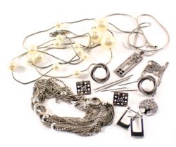 A group of silver and other costume jewellery, comprising a pair of circular stud earrings white met