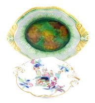 A 19thC majolica oval dish, with moulded borders, marked, 36cm wide, and an ironstone type comport o