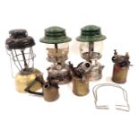 Two Colman's paraffin lamps, a camping lamp, and three part brass blow torches. (6)