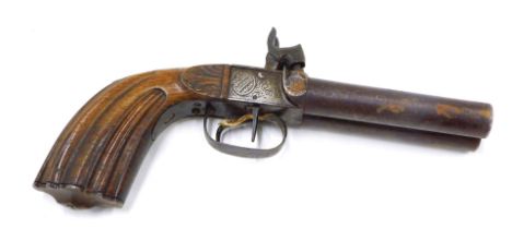 A 19thC double barrel percussion pistol, with foliate scroll engraving to the box lock plates, and c