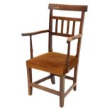 A 19thC yew open armchair, with rail back, shaped arms and a padded seat, on plain legs.