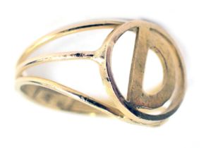 A signet ring, of circular design bearing the initial D, on V splayed shoulders, gold plated, ring s