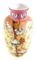 A Victorian white opaque glass vase, decorated in coloured enamels with flowers, 29.5cm high.