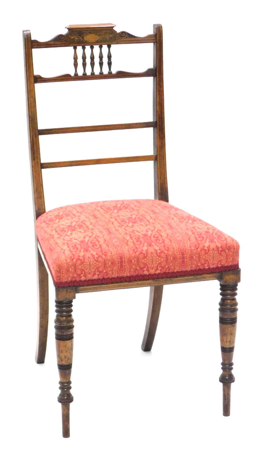 A late Victorian rosewood side chair, the rail back with spindle turned supports above a padded seat