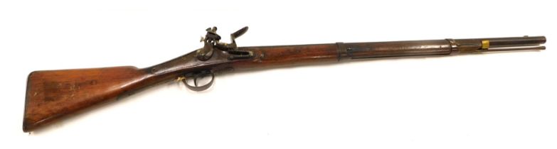 A 19thC Brown Bess type flintlock musket, with ramrod, length of barrel 82cm.