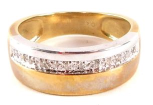 A 9ct gold dress ring, of bicolour design, set with single panel of tiny diamonds, ring size R½, 4.9