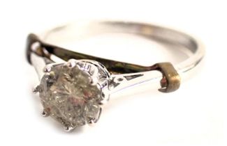 A diamond solitaire ring, set with a single round brilliant cut diamond, approximately 1ct in eight