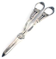 A pair of Victorian silver grape scissors, each cast with shells, etc., Sheffield 1891, 3.31oz.