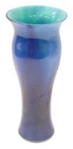A blue Art Glass vase, with a flared rim and swirl design body, 26cm high.