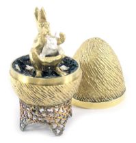 A Stuart Devlin silver parcel gilt Kangaroo and Sprung Joey egg, London 1974, with unmarked silver g